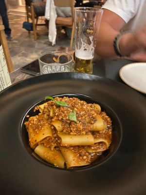 Simple but fab - vegan mince pasta, quite nutty, really good texture and like nothing we’ve tasted in England! at Almond in Paros