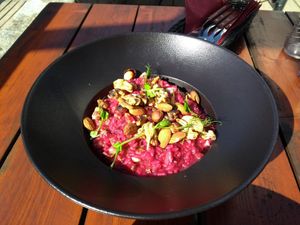 Red beet risotto with roasted nuts at Restavracija Kramar in Bohinjsko Jezero