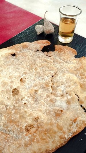 Orelleta de Poblet amb vi dolç i figues at Restaurante El Cortijo in Montblanc