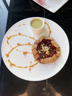 Strawberry fruit galette - fruit is rotating, SO good  at The Green House in Wilmington