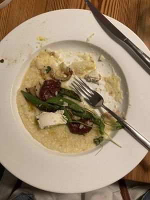 Marsh Hen Mill Grits with snap peas, fennel, strawberries, and almond ricotta  at The Green House in Wilmington