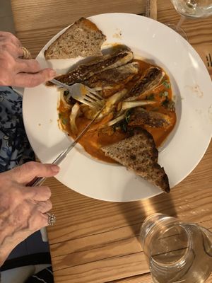 Italian Sausage with fennel, onion, kale, tomato sauce and toast  at The Green House in Wilmington