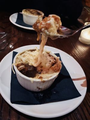 Vegan French Onion Soup (vegan cheese pull)  at Tartine Bistro in Rocky River