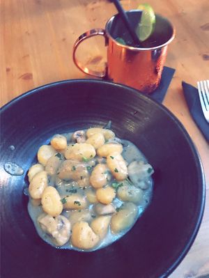 Quinoa gnocchi with truffle sauce and a Moscow mule cocktail  at La Famiglia in Zadar