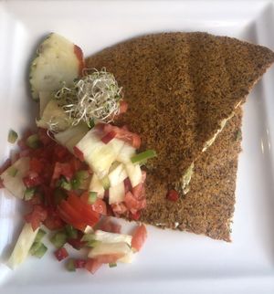 Quesadillas with a pesto and cheese filling (raw vegan)  at Botanique in Vilnius