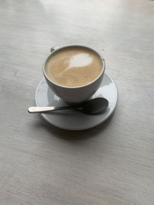 cappuccino w/ oat milk at Massolit Books & Café in Krakow