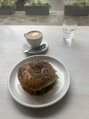 vegan bagel & cappuccino  at Massolit Books & Café in Krakow