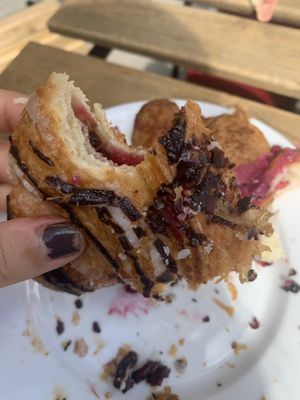 Cherry and chocolate croissant  at Massolit Books & Café in Krakow