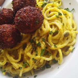 Spaguetti grano duro, rustic tomato sauce, chickpea meatballs with a touch of Sicilian lemon, natural spices at Pira na Banana in Sao Paulo