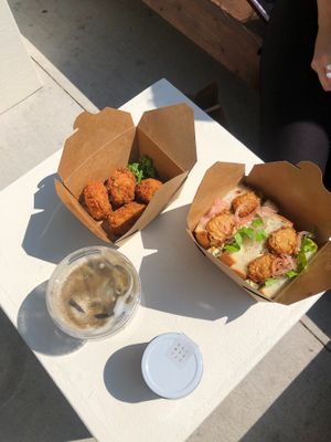 Teriyaki Karagee sandwich and Hojicha latte at Tsuchi Cafe in Toronto