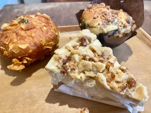 Almond hojicha sticky bun, apple crumble cheesecake, and pumpkin-filled fried dough! at Tsuchi Cafe in Toronto