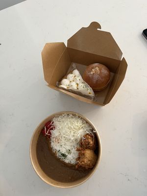 Curry with karaage, yuzu pie  at Tsuchi Cafe in Toronto