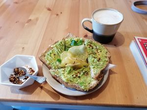 Avo toast with chilli flakes and a chai latte at The Granary Arts Cafe in Nantwich