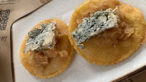 tortos con cabrales y cebolla caramelizada  at La Xagarda in Asturias