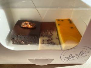 A small cake box at Lola's Kitchen (at The Bridge) in Zurich