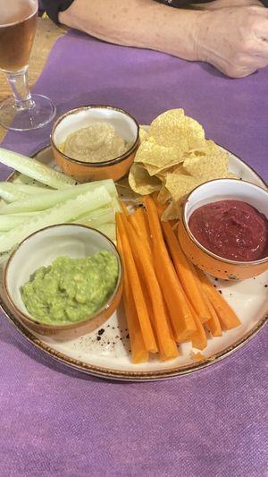 Tabla con dos tipos de hummus y guacamole   at Gusto BistroBar in Blanes