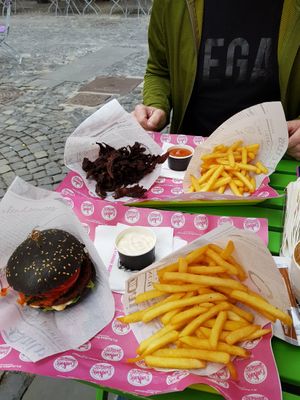 Sticky, spicy oyster mushrooms with fries and bbq sauce and Mustard burger with garlic mayo and fries at FunKink Burgers in Bucharest
