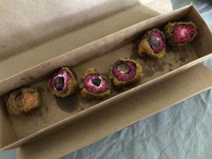 Pink on the wing at Sushi & Roll in Madrid