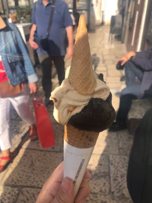 Kaki and dark chocolate on a cone at Gelateria Gentile  in Bari