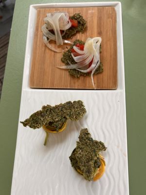 "Mise en bouche" - Pickled fennel and watermelon on homemade seed cracker.  at Iris Café in Bardigues