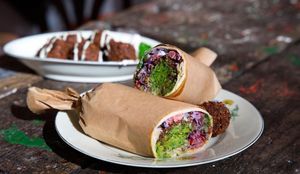 Our falafel balls are scooped especially for your order and our falafel mix is made from scratch every day!  at FLFL Haarlem in Haarlem