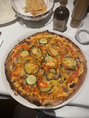 vegan mozzarella cheese vegetable pizzaa  at Prato in Brasov