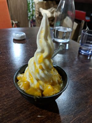 Ice cream with mango sauce (late summer seasonal) at Aju in Osaka