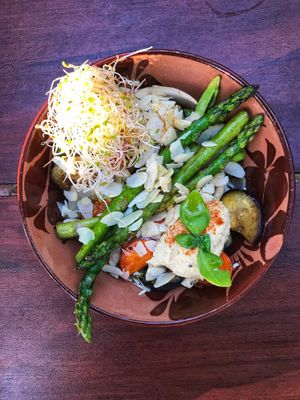 Veggie Bowl: Pan fried broccoli, eggplant, mushrooms, spring onion, carrot and asparagus topped with sliced almonds and hummus   at Papa Deluxe Baked Potato & Salad Bar - Tulum in Tulum