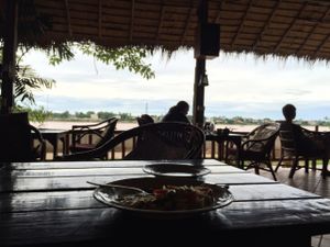 Eating while looking out to Laos over the Mekong at Mut Mee Restaurant in Nong Khai