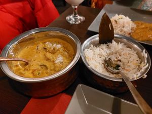 Vegetables in coconut curry with rice at Naan & Curry in Mannheim