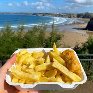 Vegan battered sausage and chips  at The Harbour Chippy in Newquay