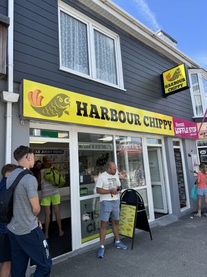 Town centre near the beach. Friendly staff .. Vegan options displayed just inside the shop.. Chips, sausages, burgers, nuggets, pea fritter and curry sauce. Quick service.   at The Harbour Chippy in Newquay