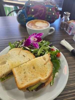 Salad with edible 🌸 at Victory Caffe in Van Nuys