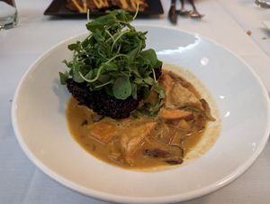 Thai red curry and rice cake at True Bistro in Somerville