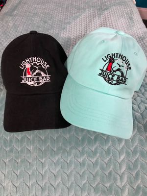 Hats are $25. Available in Black or Mint Green. Shipping available on our Square Site. https://lighthouse-juice-bar.square.site at Lighthouse Juice Bar in Harvey Cedars