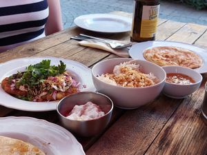 Starters, sides, and chutneys at Café Tropical in Mannheim