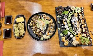 Tofu starter, crunch box, black rice box and some extra sushi pieces   at Niiko Sushi x Vegan in Leipzig