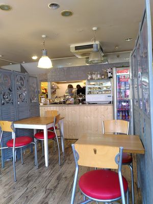 Inside view of the café looking towards the cakes and counter. at 4 Coo Wynd in Falkirk