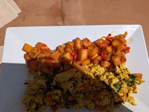 tofu scramble with cheese, spinach, and tomato, breakfast potatoes at Strange Brew Cafe in Binghamton
