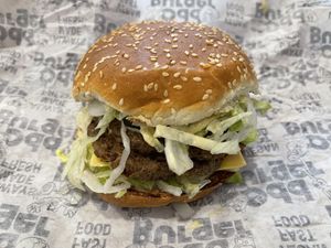 Famous burger. Smash patty. Extra sauce. No mid bun    at Odd Burger in Vaughan