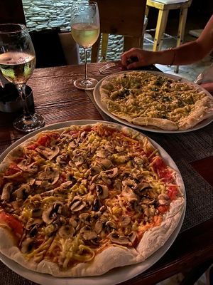 Vegan mushroom pizza and vegan truffle oil pizza  at Sotto Sopra in El Gouna