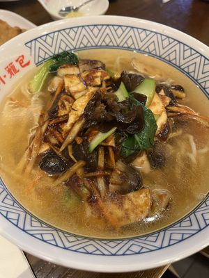 Veggie noodle soup. Amazing flavor! That sauce on top is so good!  at Nan Xiang Xiao Long Bao in Flushing
