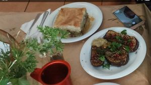 Mousakka and grilled eggplant with pomegranate and raisins  at To Stachi in Crete