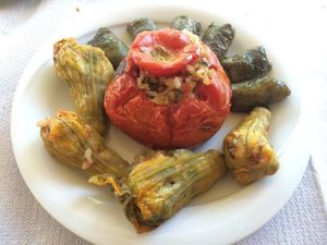 stuffed tomato, zucchini flowers, and grape leaves at To Stachi in Crete