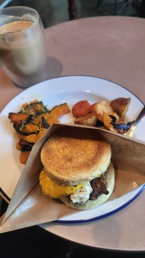 Cheeseburger with three sides at The Nuts Exchange in Tokyo
