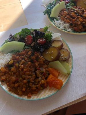 Lentils dal with rice and salad at Fava Mercearia Café in Lagos