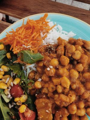 Dish of the day (€5) - Garbanzo curry with rice and salad  at Fava Mercearia Café in Lagos