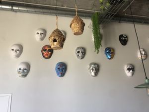 Face mask Art exhibition in FAVA   at Fava Mercearia Café in Lagos