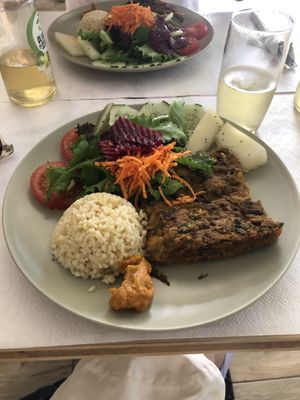 Lunch of the day (chickpea medaillon with rice and salad)  at Fava Mercearia Café in Lagos