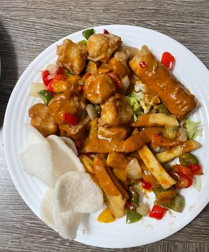 Salt and pepper tofu and chips, spring rolls, prawn crackers, curry sauce  at Cheungs Vegan Kitchen in Bristol